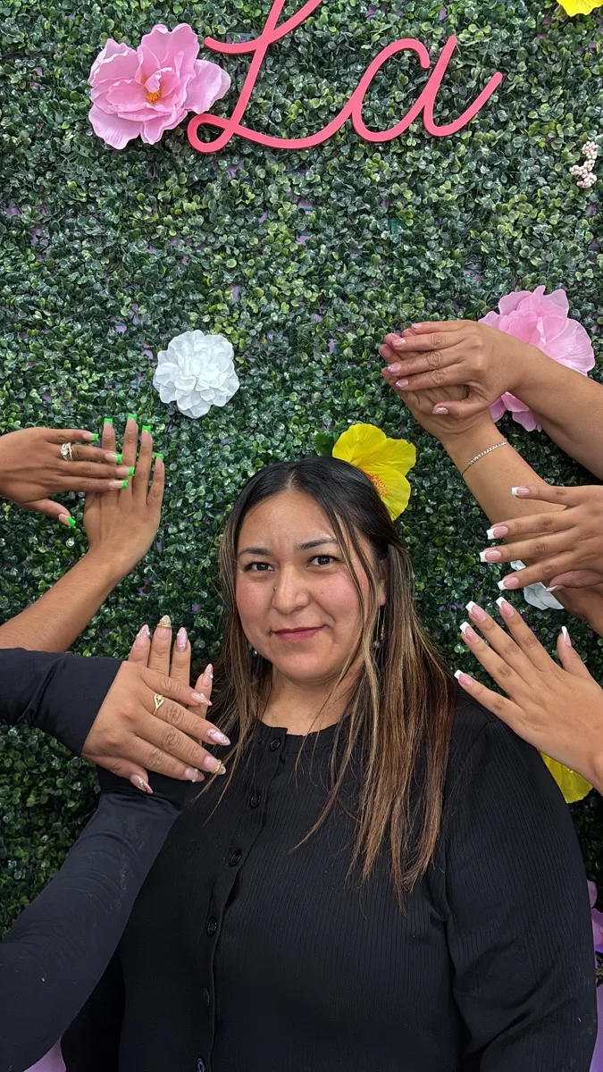 Queen surrounded by custom nail sets