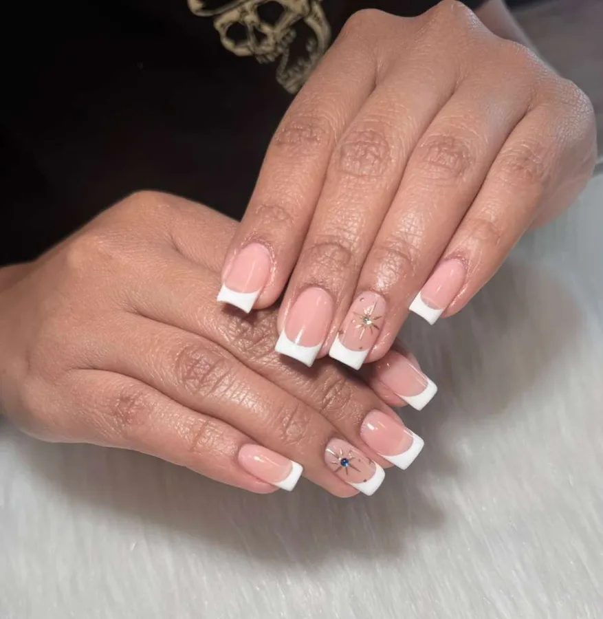 Crisp white French tips by Jessica