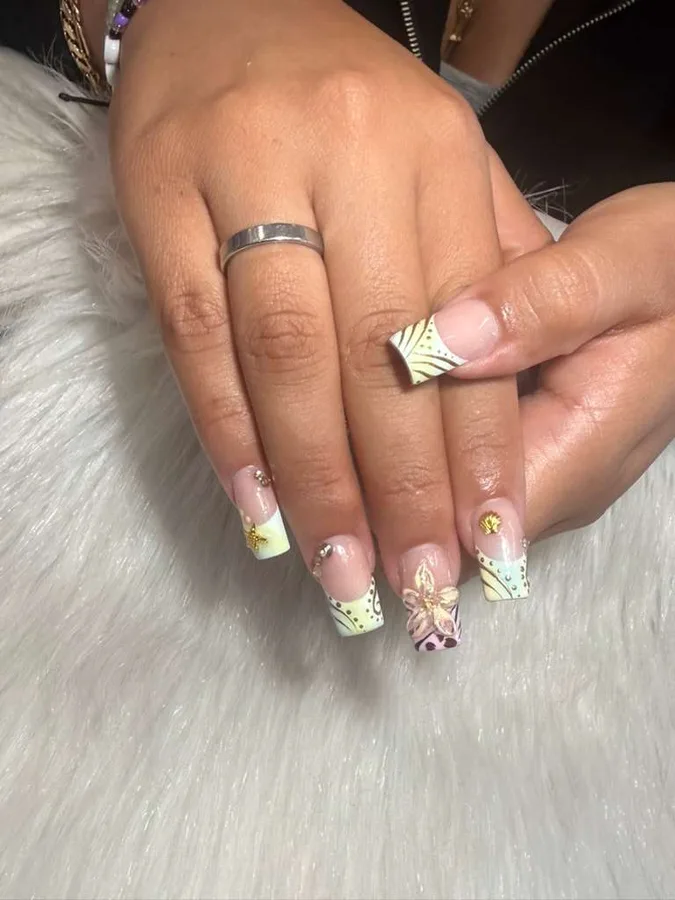 Lime green patterned French tips by Jessica