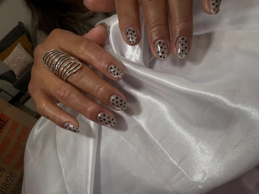 Animal print and polka dot nail art by Jessica